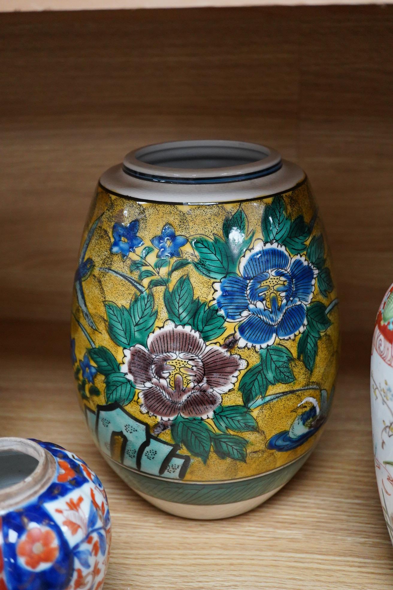 A Japanese green Kutani vase, a pair of Imari vases and smaller vase (4)